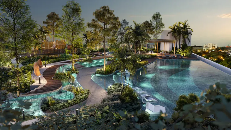 Alora Residences Level 10 facilities deck with Horizon Pool and landscaped walkways at dusk